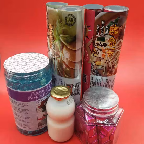 Thermorétractable imprimable perforé de qualité alimentaire PVC/Pet Film Roll Sleeves Wrap Band Label Seal pour l'eau/l'énergie/la bouteille de boisson de jus
